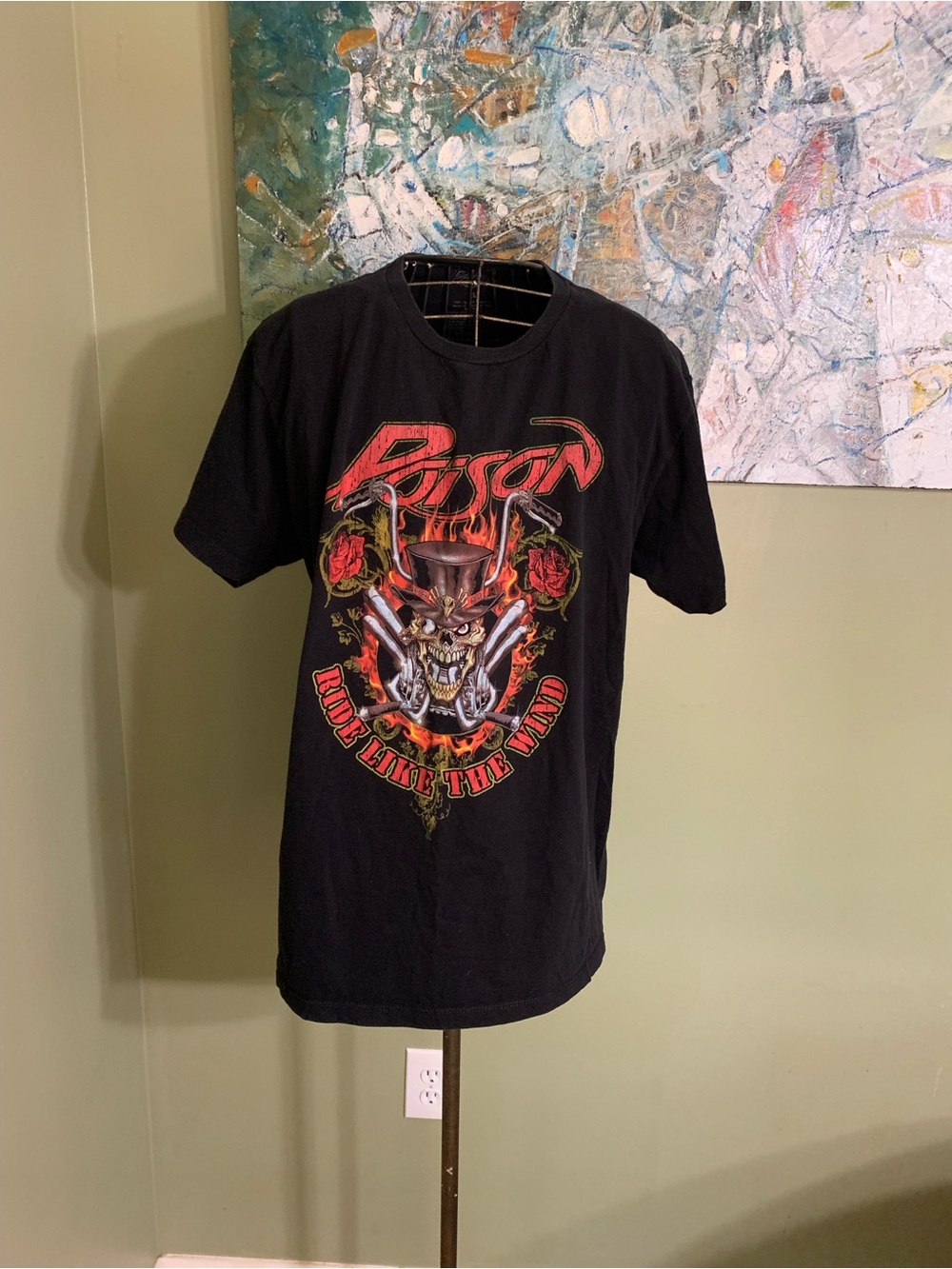 Poison band T-shirt in size XL.
